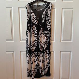 BLACK AND WHITE SLEEVELESS WITH SHEER BLACK NETTED BACK PLUS SIZE 3X NWT